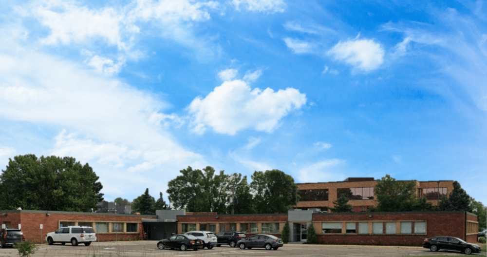 An exterior image of a commercial office building in Edina, Minnesota where an Ellie Mental Health Therapy & Psychiatry Clinic is located.