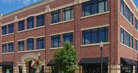 An exterior image of a commercial office building in Downers Grove, Illinois where an Ellie Mental Health Therapy Clinic is located.