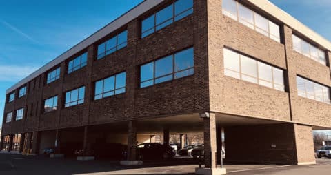 An exterior image of a commercial office building in West Hartford, Connecticut where an Ellie Mental Health Therapy Clinic is located.