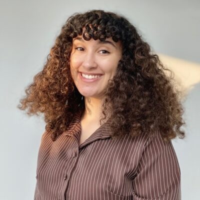 Quannese “Q” Hildebrand-Travis headshot